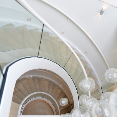 Downward View Of Elegant Staircase With Lights