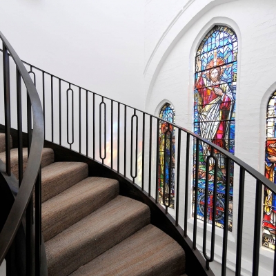 Metal Spiral Staircase With Patterned Windows